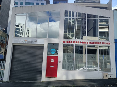 A city warehouse where home living, work and play are defined by colour