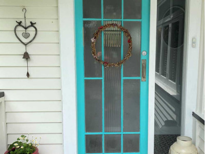 A country bungalow gets a second life with gorgeous greys and youthful blues and greens