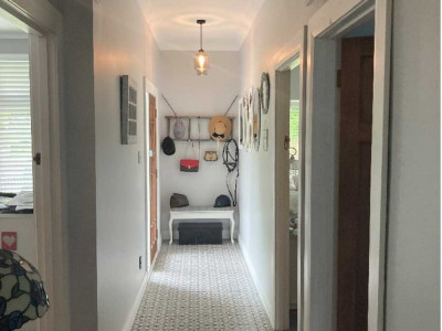 A country bungalow gets a second life with gorgeous greys and youthful blues and greens