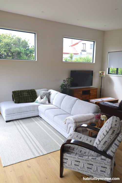 Living room walls in Resene Half Fossil, ceiling in Alabaster. 
