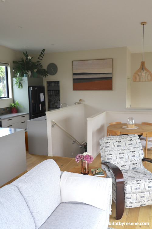Living and kitchen walls in Resene Half Fossil, ceiling in Alabaster. 