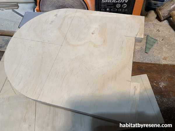 A piece of wood cut into a curve