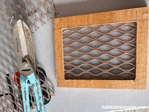 A square of wood with a wire interior