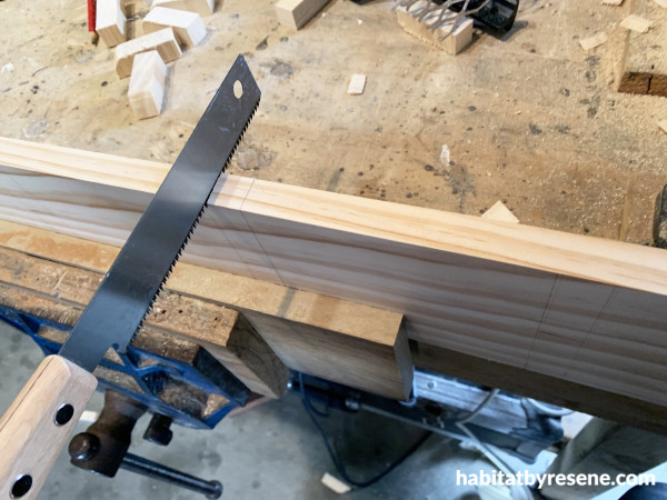 A saw cutting wood
