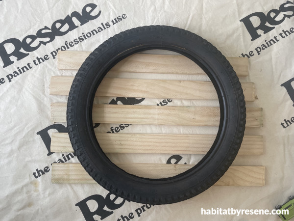 A tire on pieces of wood