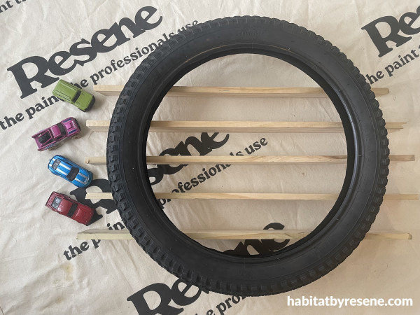 A tire on pieces of wood