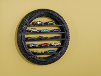 Transform an old tyre into a toy shelf