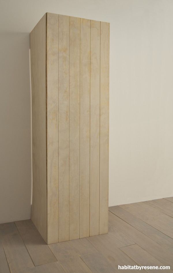 A wooden corner wardrobe