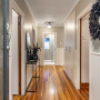 Hallway painted in Resene Tasman and Resene Black White