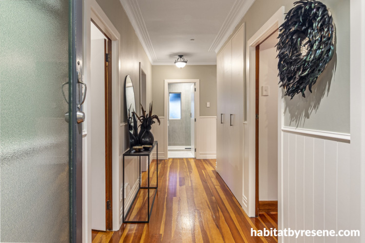 Hallway painted in Resene Tasman and Resene Black White