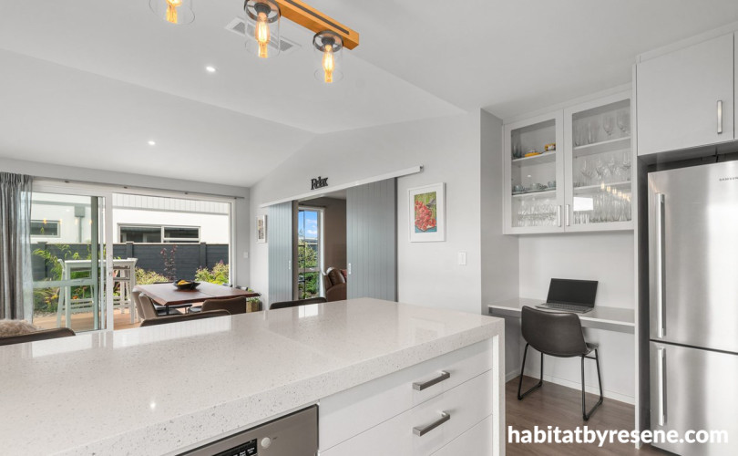 Kitchen and dining area painted in Resene Concrete