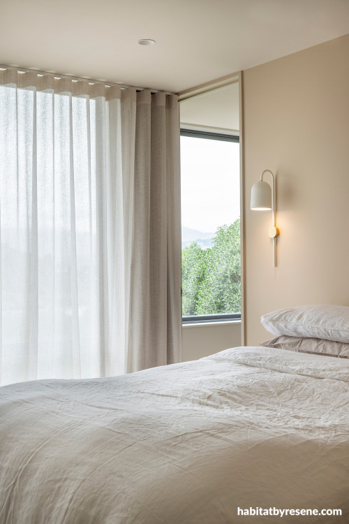 Neutral bedroom painted in Resene Double Biscotti and Resene Quarter Biscotti
