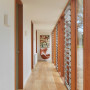Hallway painted in Resene Quarter Thorndon Cream and doors in Resene Double Lemon Grass