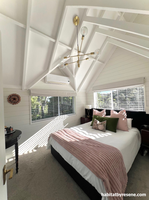 master bedroom in Resene Rice Cake and Resene Ceiling Paint White.