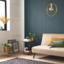 Living area featuring statement teal blue wallpaper with subtle geometric pattern