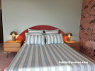 Bedroom featuring Resene wallpaper and painted in Resene Rainee