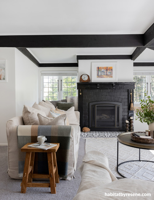 Living room painted in Resene Black and Resene Eighth Thorndon Cream