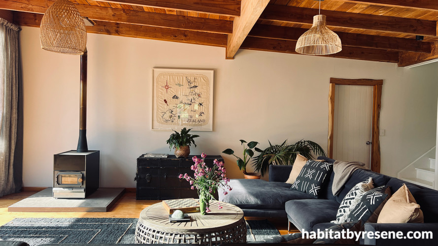 Living room painted in Resene Bianca and featuring a timber ceiling
