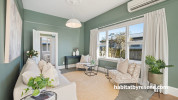 Living area painted in Resene Black White and Resene Vantage Point