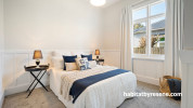 Bedroom painted in Resene Double White Pointer and Resene Black White
