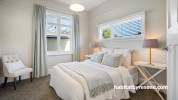 Neutral bedroom painted in Resene Double White Pointer and Resene Black White