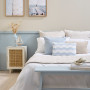 Bedroom featuring wainscoating and walls in Resene Parchment