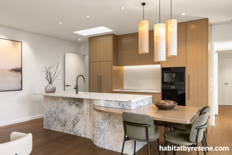 Kitchen featuring walls and lacquered island in Resene Half Wan White