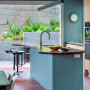 Open plan kitchen in fresh blue colour