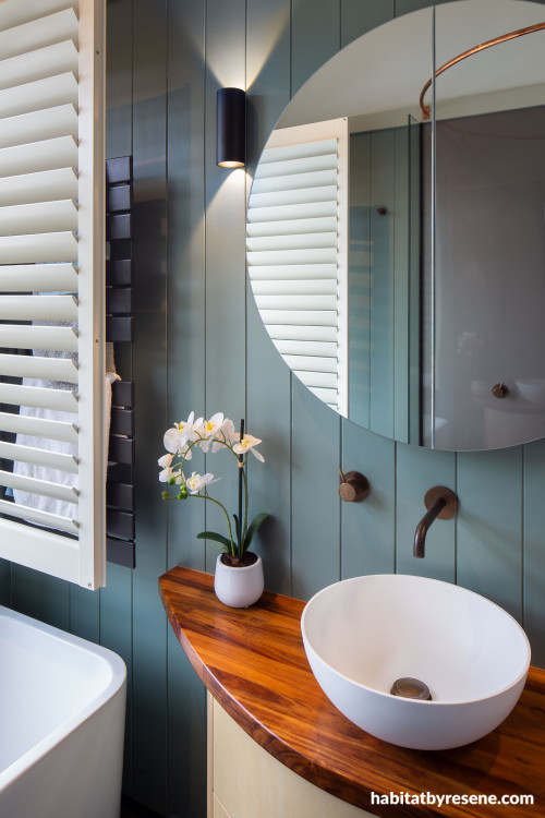 Charming bathroom painted in relaxing blue colour