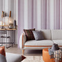 Livingroom wallpaper with vertical stripes creates a more spacious feel 