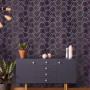 Hexagon shapes on wallpaper adds elegant touch to room