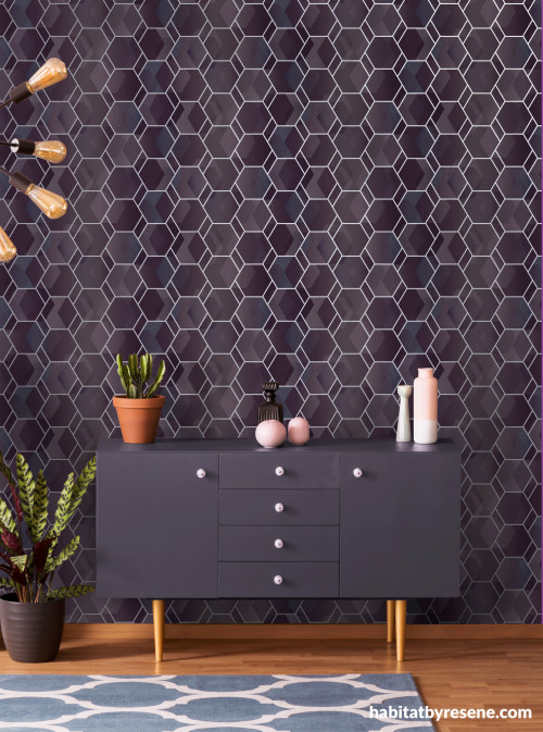 Hexagon shapes on wallpaper adds elegant touch to room 