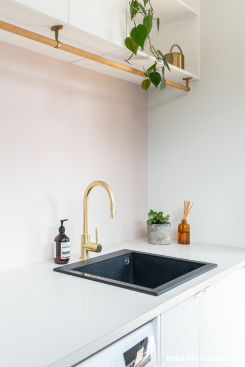 White laundry with navy blue sink