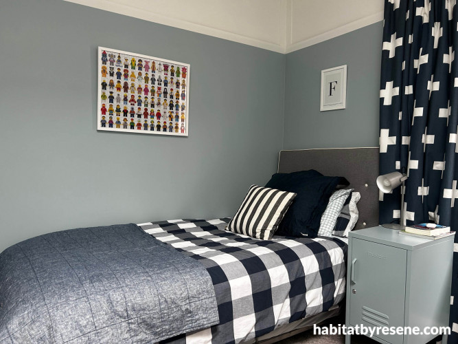 Light grey blue tone creates calming atmosphere in bedroom