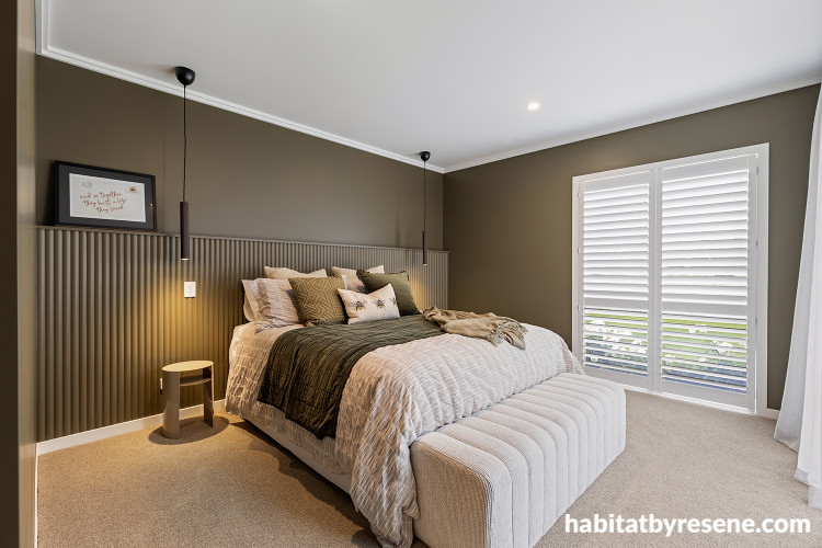 Bedroom featuring walls and panelling in deep, earthy Resene Lisbon Brown