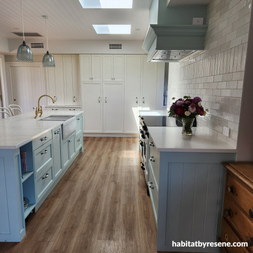 Kitchen with soft blue and white tones