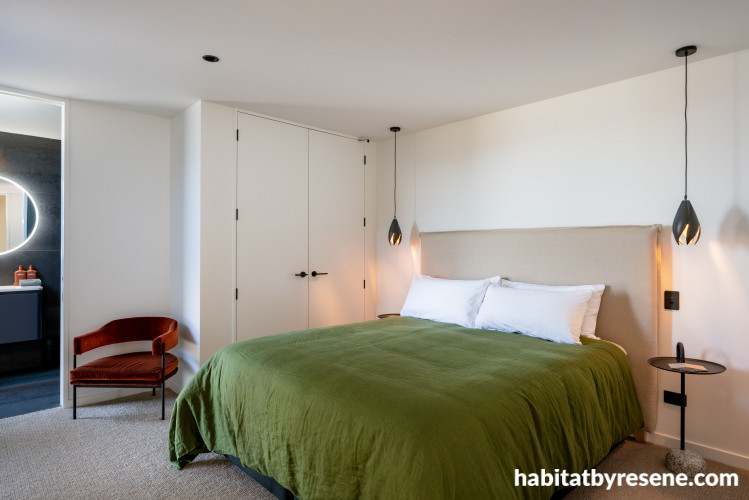 Master bedroom painted in light tones
