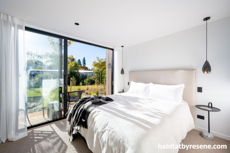 Bedroom painted in light tones creates bright atmosphere