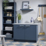 Tonal laundry uses soft greys and dark blue tones