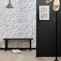 Monochromatic entryway painted in Resene Half Black White and Resene Nero