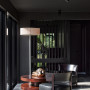 Bold, dark living area painted in Resene Ironsand and Resene Half Bokara Grey