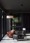 Bold, dark living area painted in Resene Ironsand and Resene Half Bokara Grey