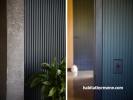 Living room painted in Resene Element and hallway painted in Resene Midnight Moss