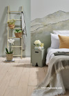 Bedroom featuring nature-inspired mural painted in multiple Resene colours