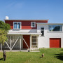 House painted in Red Oxide and Sea Fog