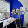 Office with blue and white feature wall