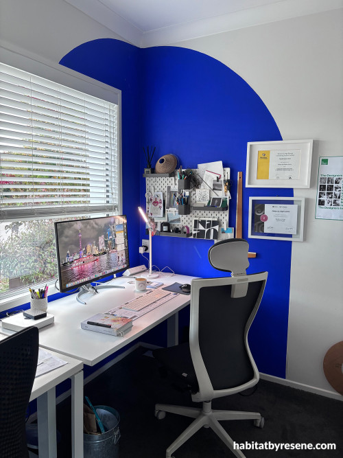 Office with blue and white feature wall