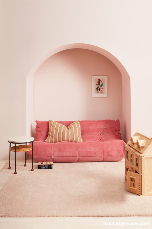 Living area featuring walls painted in soft pink Resene Contented