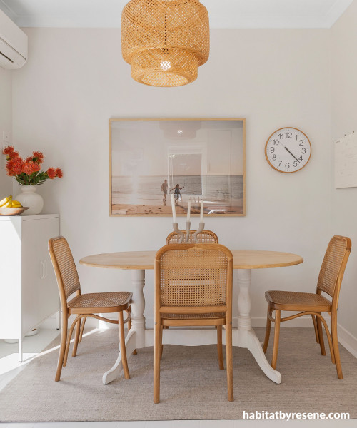 Neutral dining room featuring walls painted in Resene Wan White