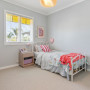 Girl's room painted in soft blue